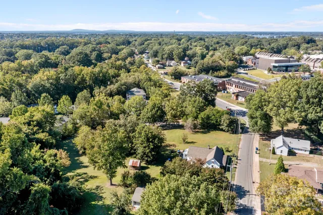 an aerial view of a city with lots of residential buildings