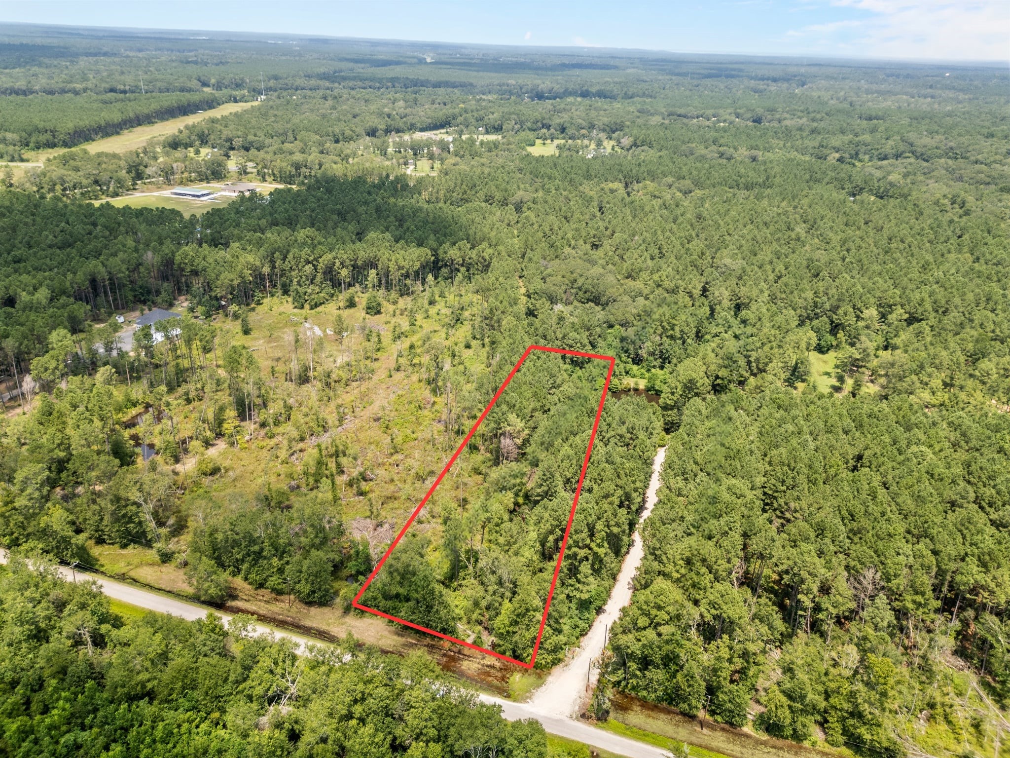 Tbd Pelican Road Shepherd, TX 77371 - Photo 3 of 7 a view of an outdoor space with a lake view