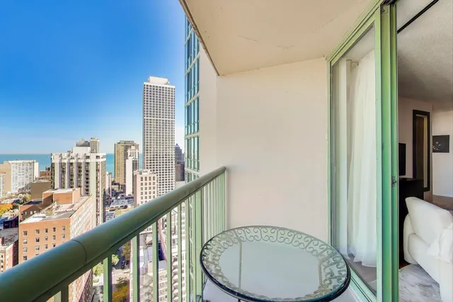 a view of a balcony with an outdoor space