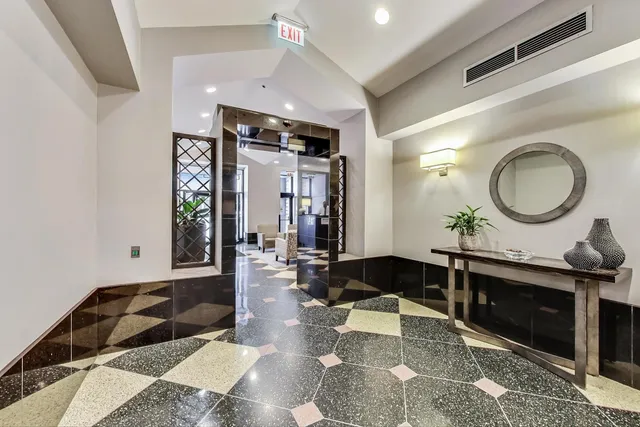 a view of an entryway with a lot of stuff