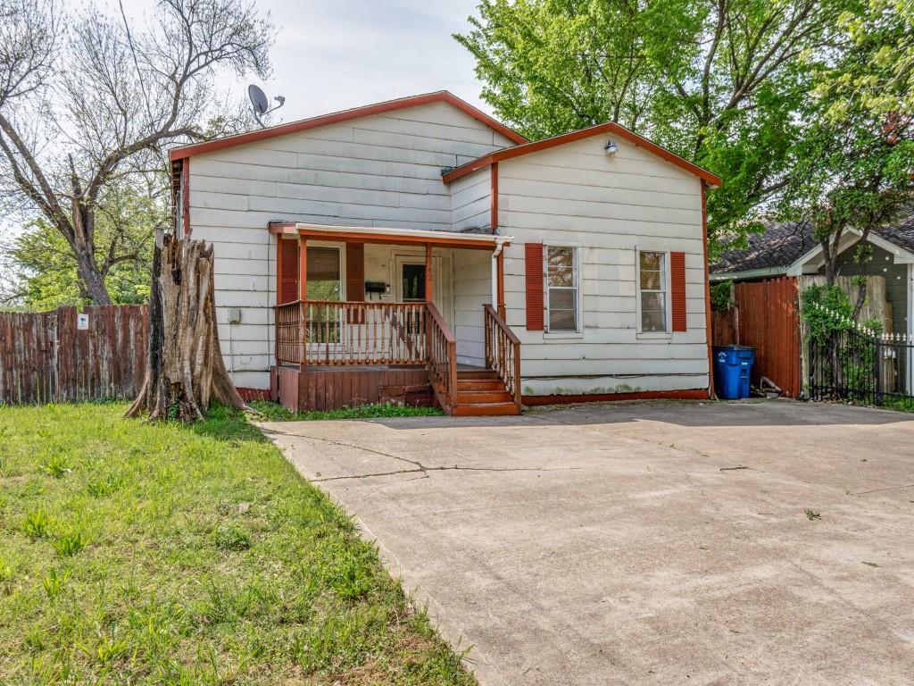 Bungalow-style house with fence and covered porch