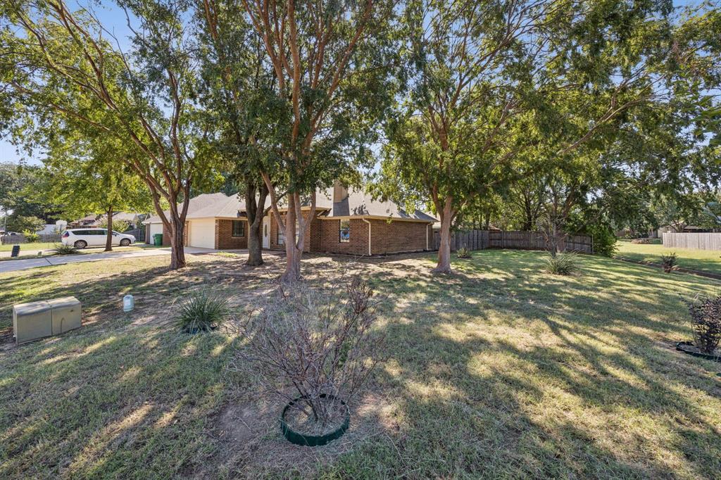 2900 Christopher Drive Denton, TX 76209 - Photo 21 of 25 a view of outdoor space with deck and tree