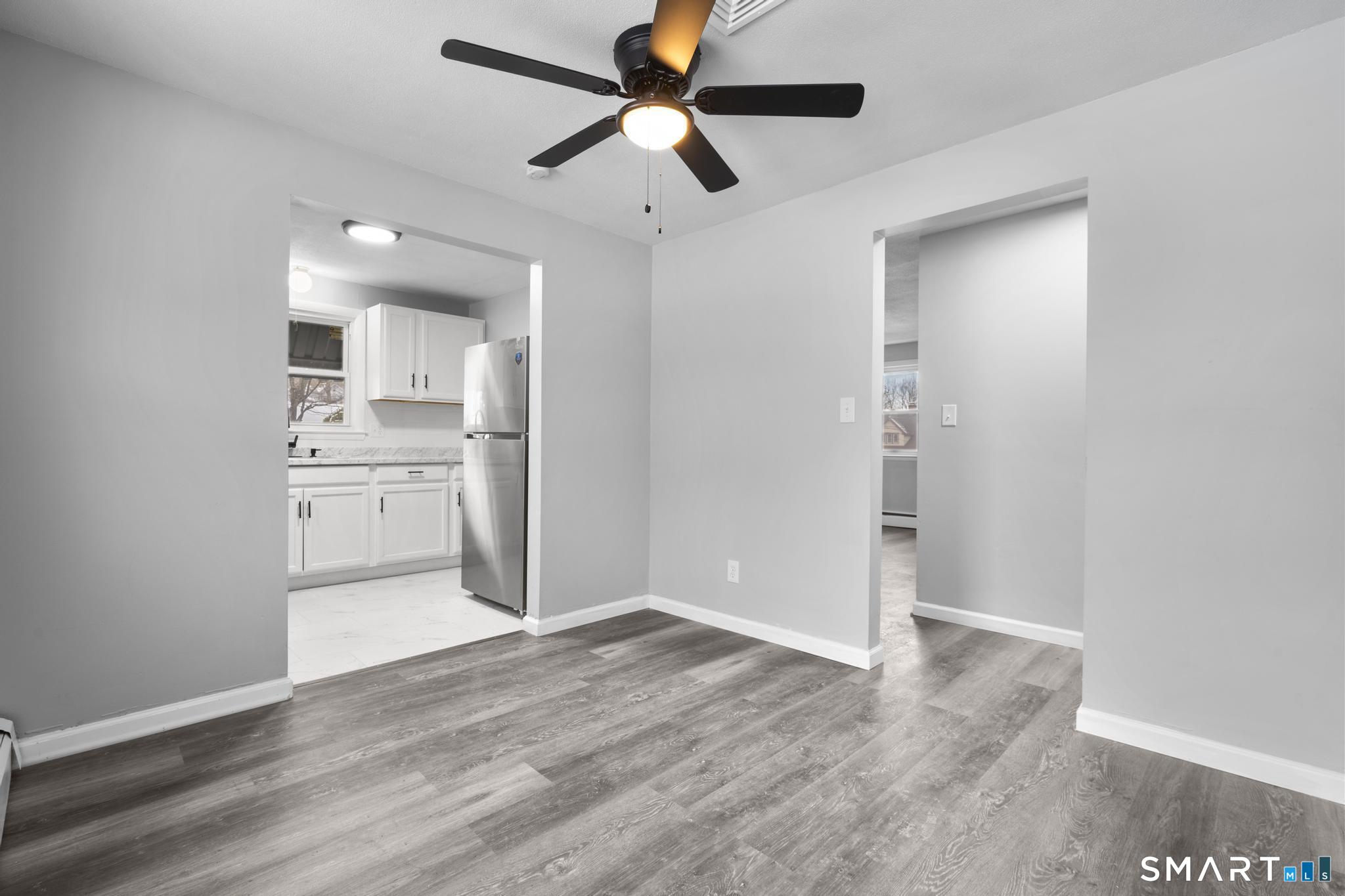 13 Allen Street Bristol, CT 06010 - Photo 11 of 40 a view of a kitchen with a sink and a refrigerator