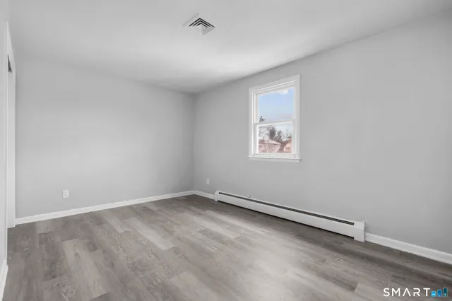 an empty room with a workbench