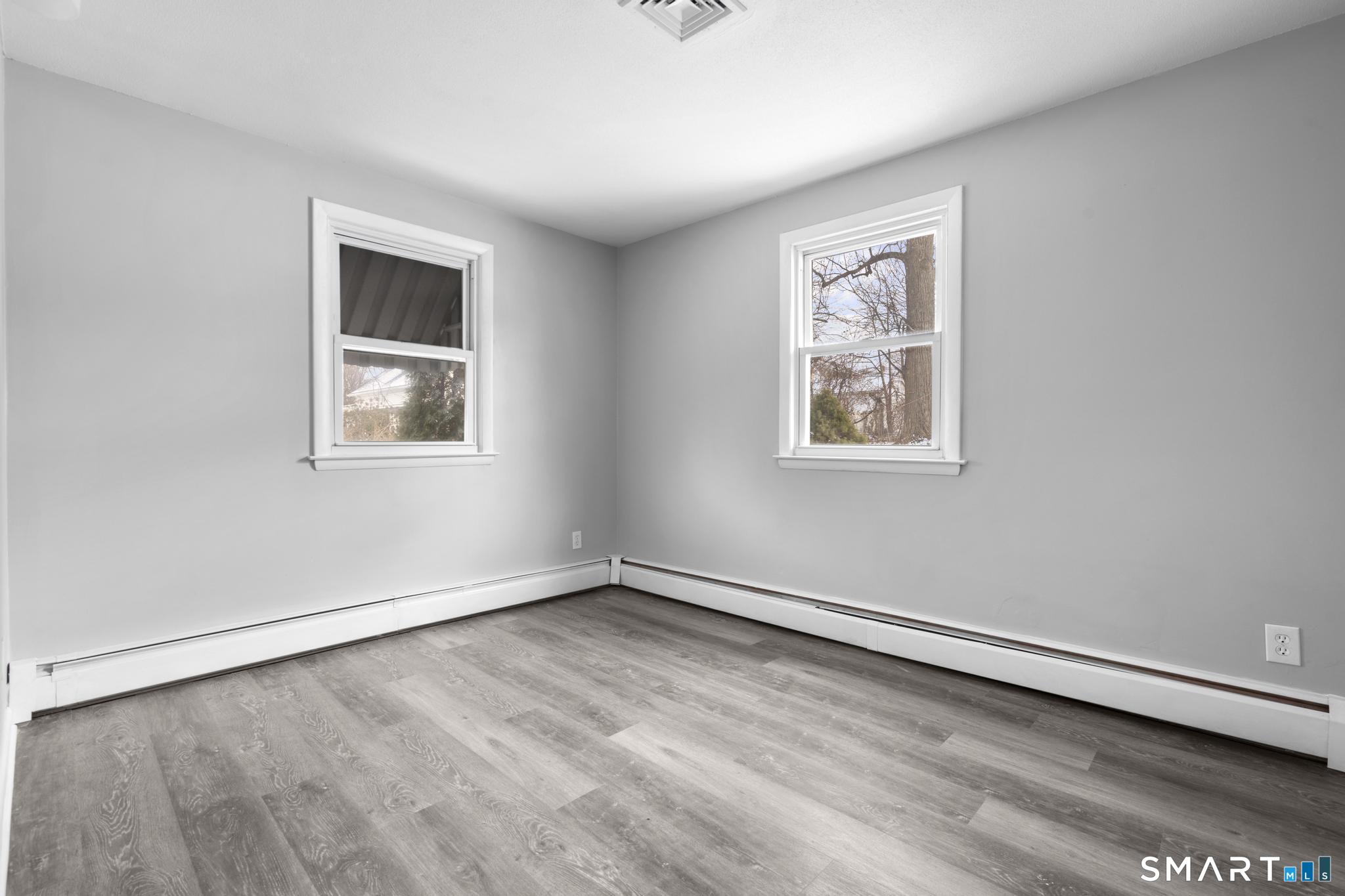 13 Allen Street Bristol, CT 06010 - Photo 25 of 40 an empty room with a window