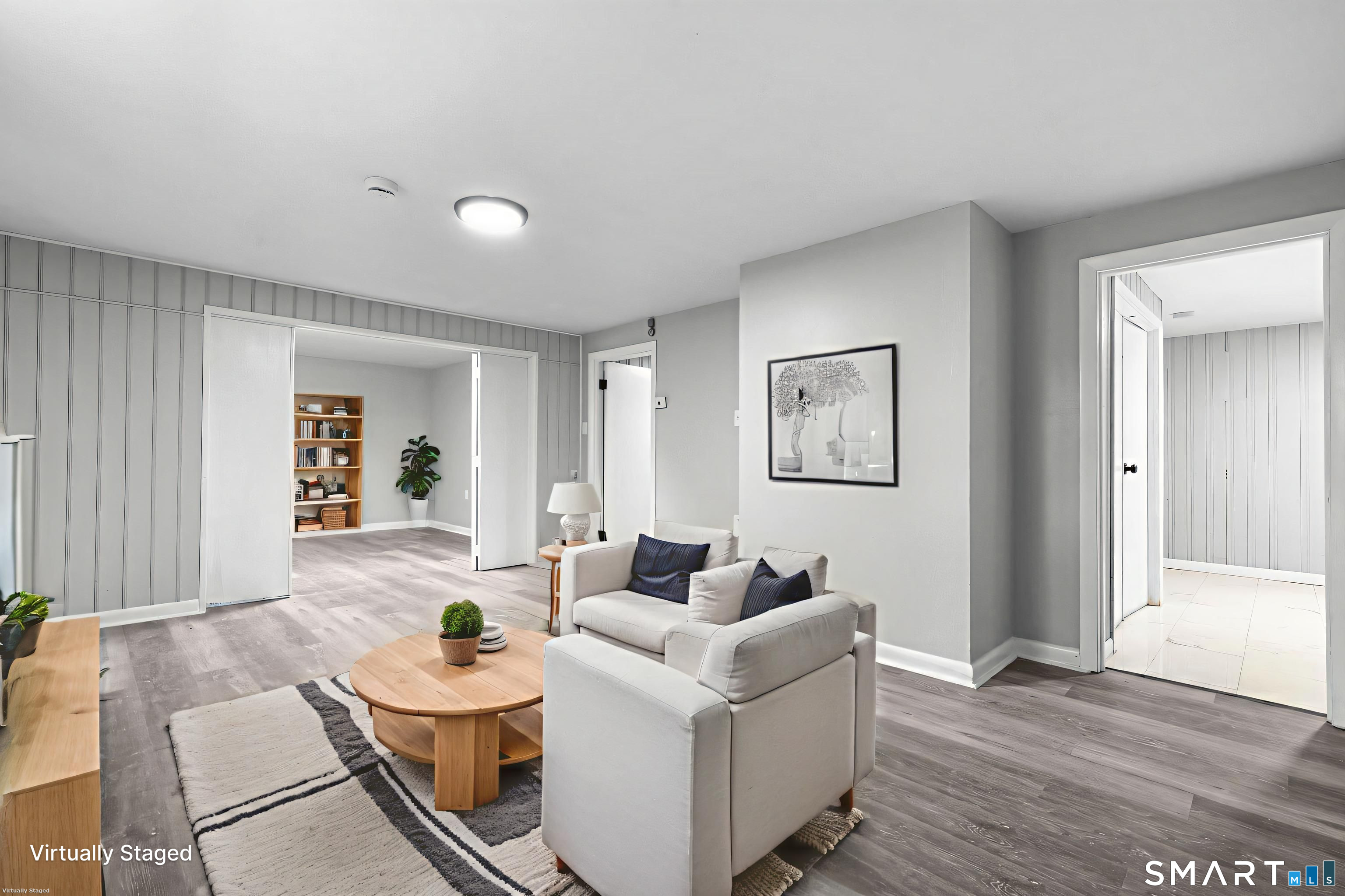 13 Allen Street Bristol, CT 06010 - Photo 30 of 40 a living room with furniture and wooden floor