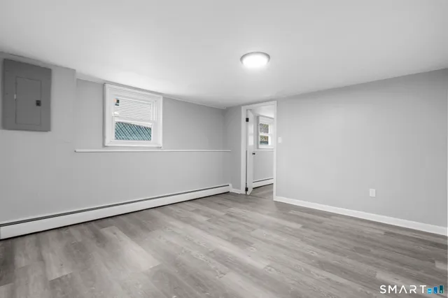 a view of a yard covered in snow