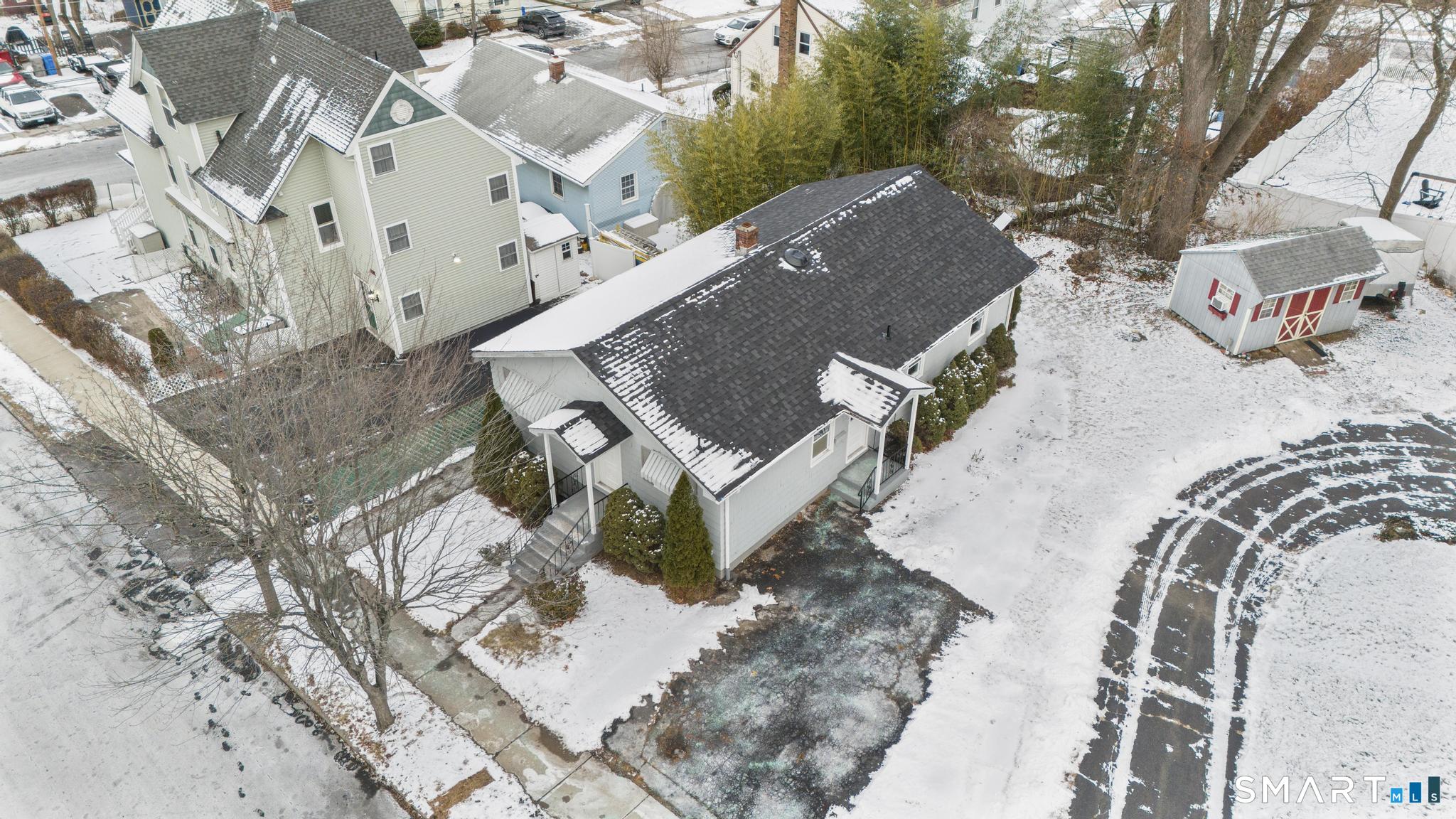 13 Allen Street Bristol, CT 06010 - Photo 39 of 40 an aerial view of a house with a yard