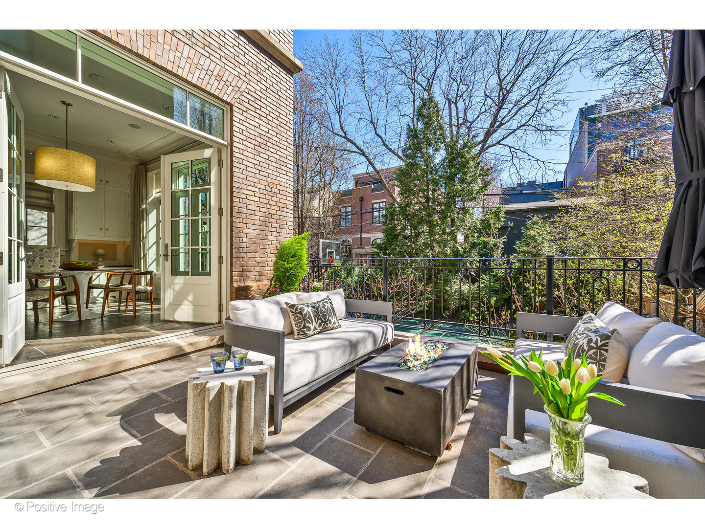 1853 North Burling Street Chicago, IL 60614 - Photo 36 of 86 a view of a patio with couches table and chairs and potted plants