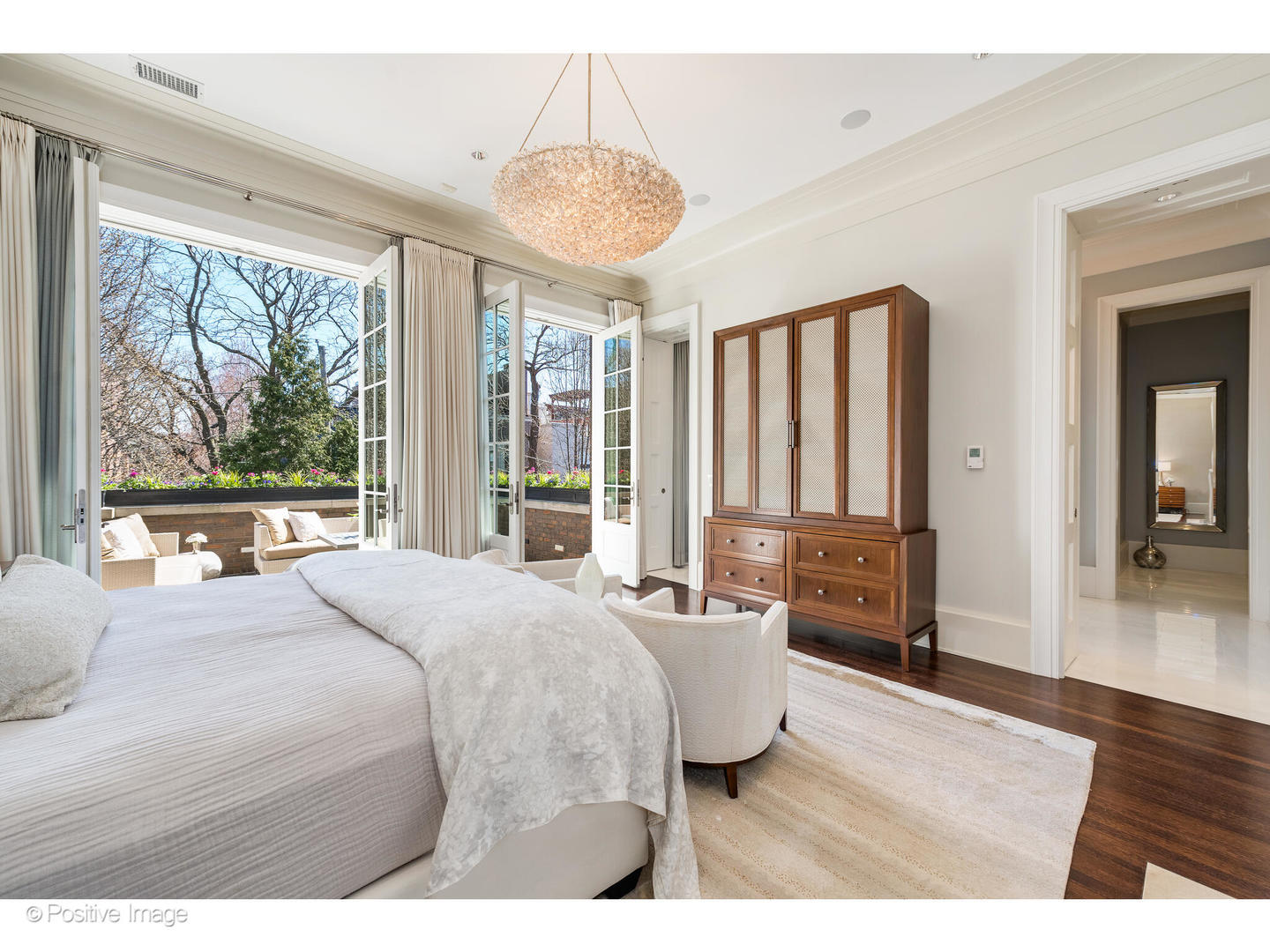 1853 North Burling Street Chicago, IL 60614 - Photo 52 of 86 a bedroom with a large bed and a large window