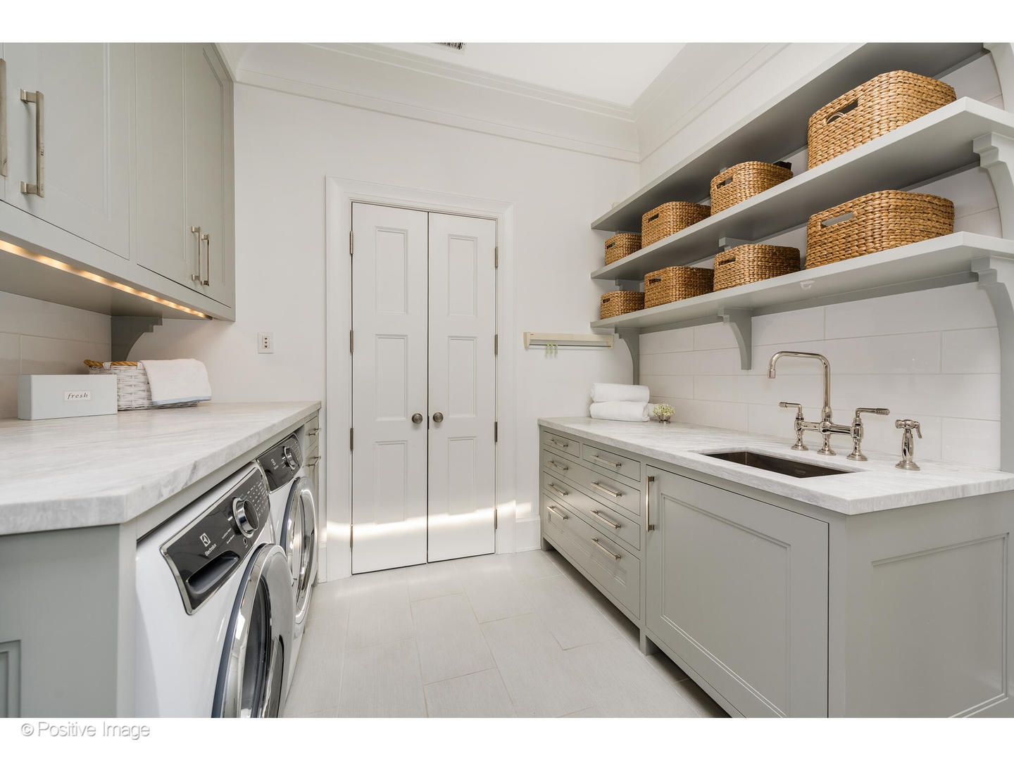 1853 North Burling Street Chicago, IL 60614 - Photo 66 of 86 a kitchen with a sink a stove and cabinets