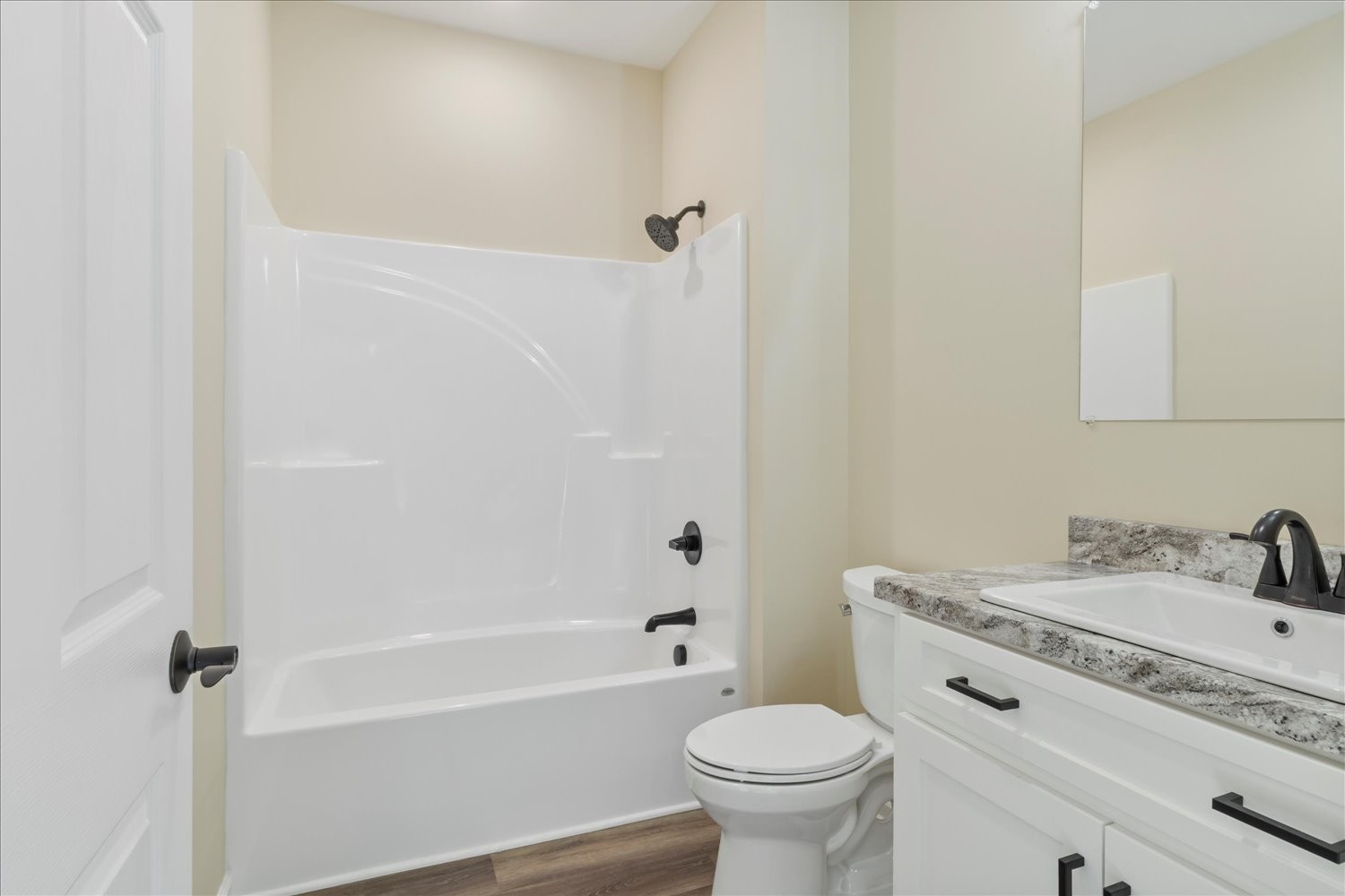 975 Weakley Creek Road Lawrenceburg, TN 38464 - Photo 25 of 49 a bathroom with a sink toilet vanity and shower