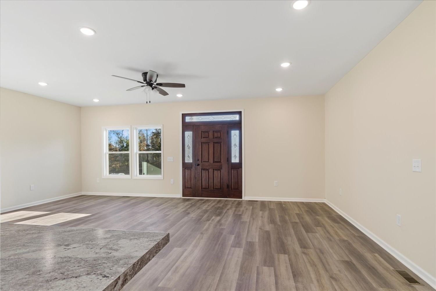 975 Weakley Creek Road Lawrenceburg, TN 38464 - Photo 5 of 49 wooden floor in an empty room with a window