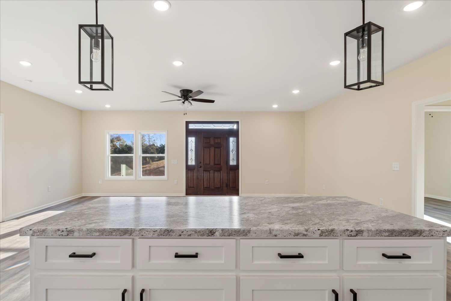 975 Weakley Creek Road Lawrenceburg, TN 38464 - Photo 6 of 49 a kitchen with granite countertop cabinets a sink and dishwasher