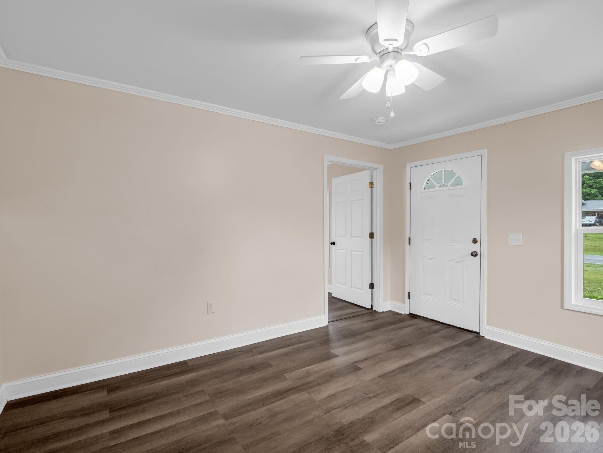 170 Dobbins Road Ellenboro, NC 28040 - Photo 15 of 32 wooden floor in an empty room with a window