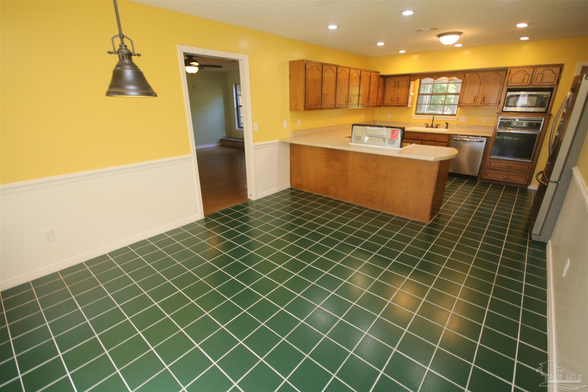 5464 Rowe Trail Pace, FL 32571 - Photo 20 of 50 leads to the family room.