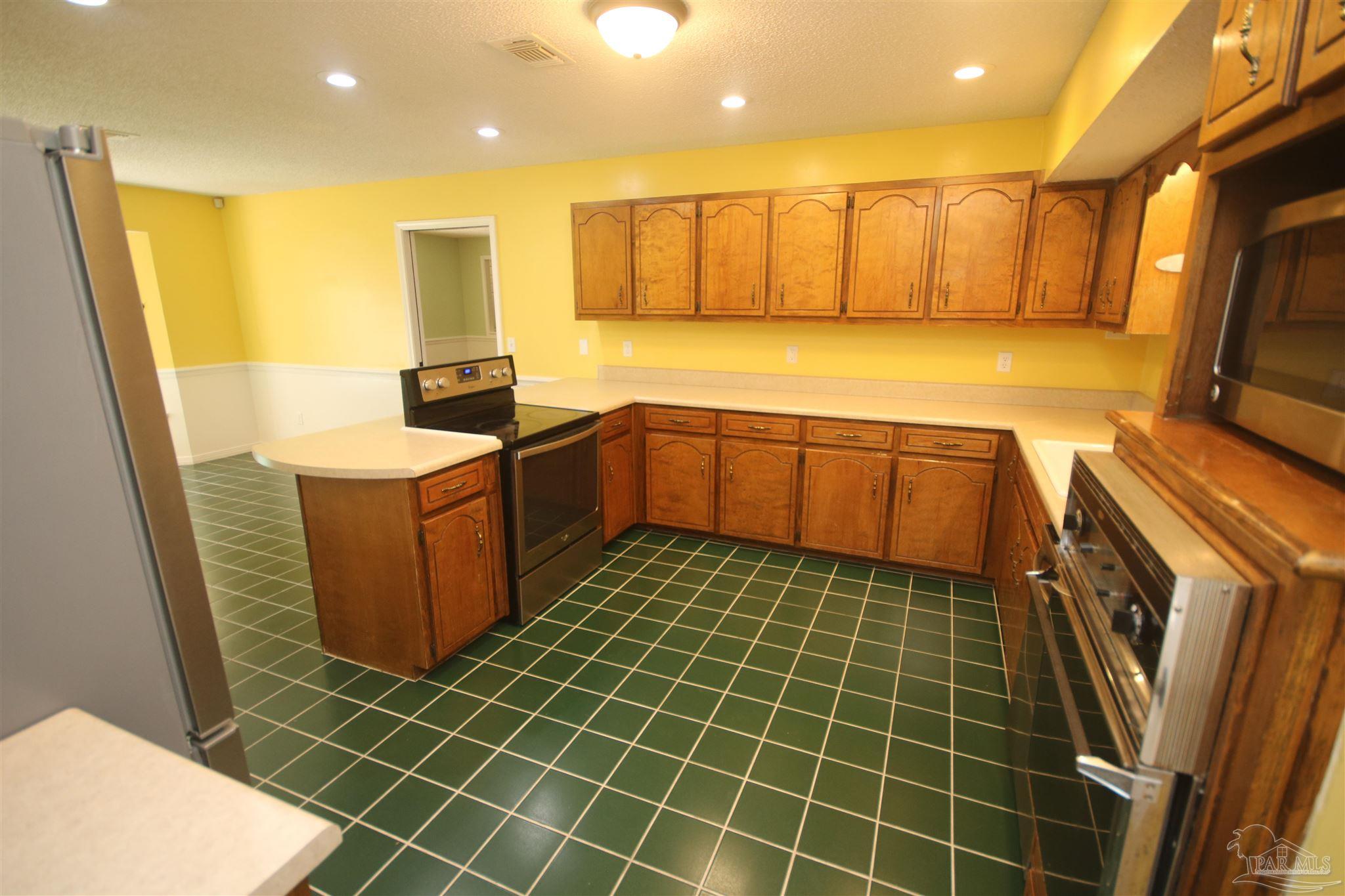 5464 Rowe Trail Pace, FL 32571 - Photo 21 of 50 cabinets for storage needs.