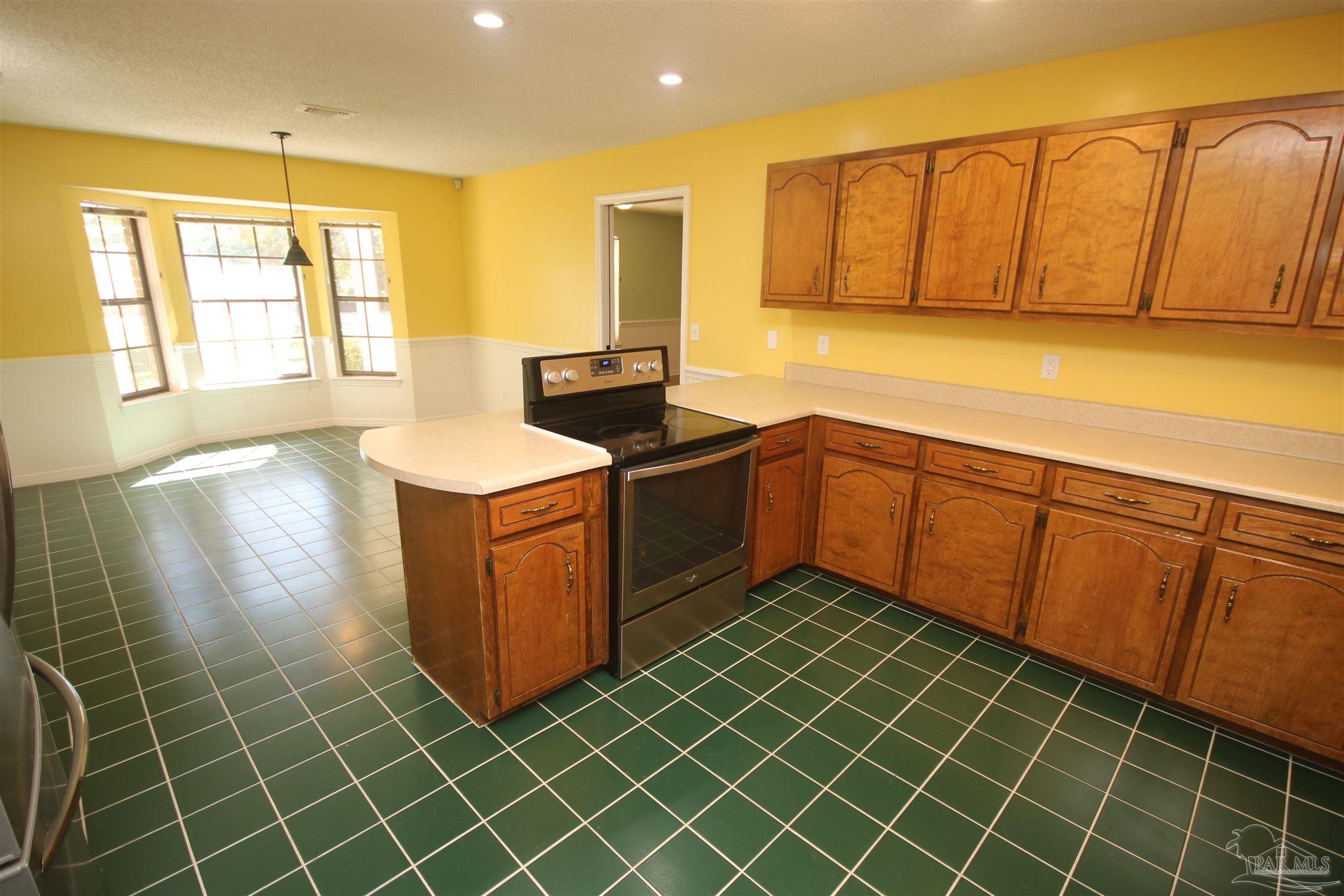 5464 Rowe Trail Pace, FL 32571 - Photo 22 of 50 windows. Breakfast area is 12 x 10.