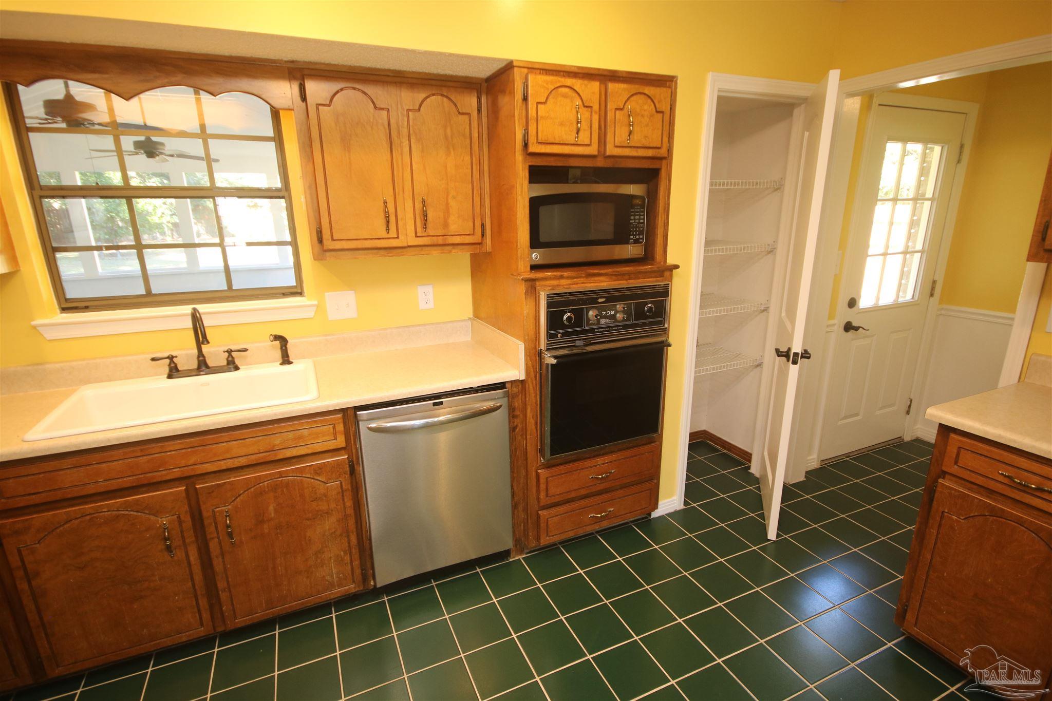 5464 Rowe Trail Pace, FL 32571 - Photo 23 of 50 New faucet 2022. Frigidaire Gallery dishwasher.