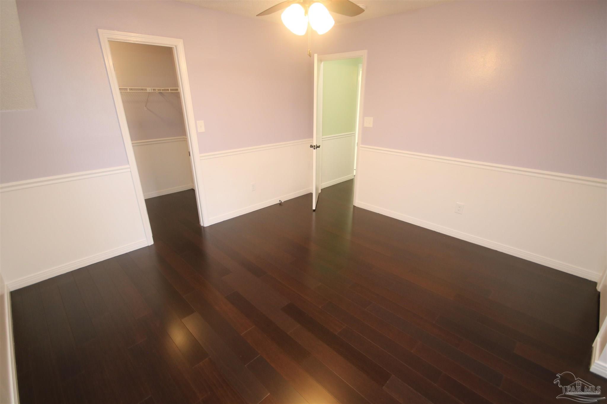 5464 Rowe Trail Pace, FL 32571 - Photo 29 of 50 Bamboo flooring in all bedrooms.