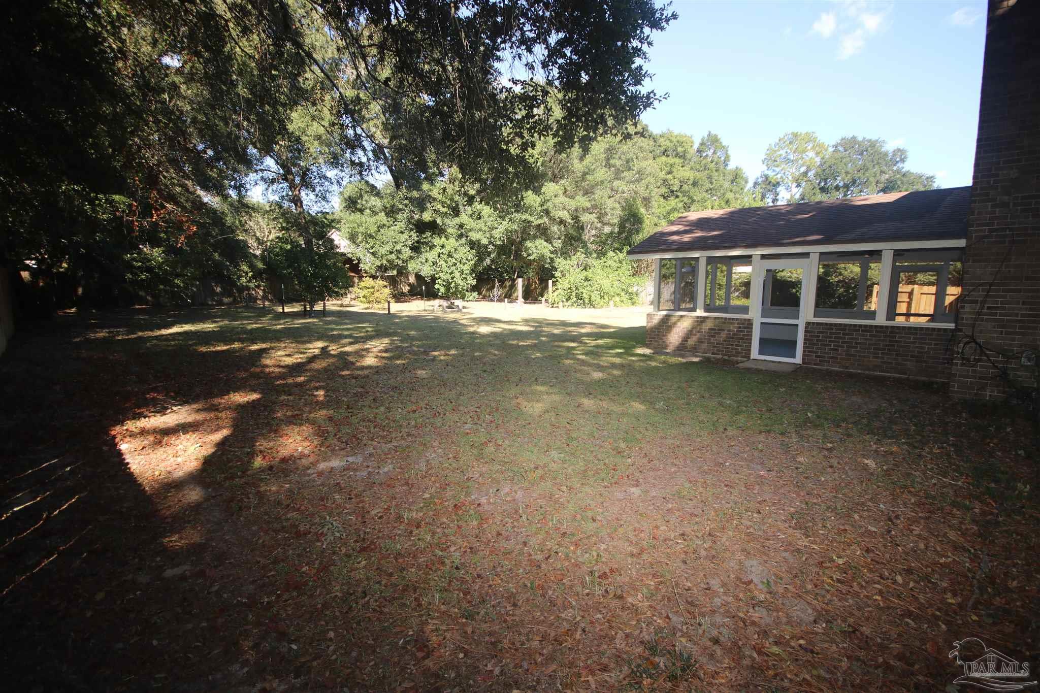 5464 Rowe Trail Pace, FL 32571 - Photo 40 of 50 flowing through the screened porch!