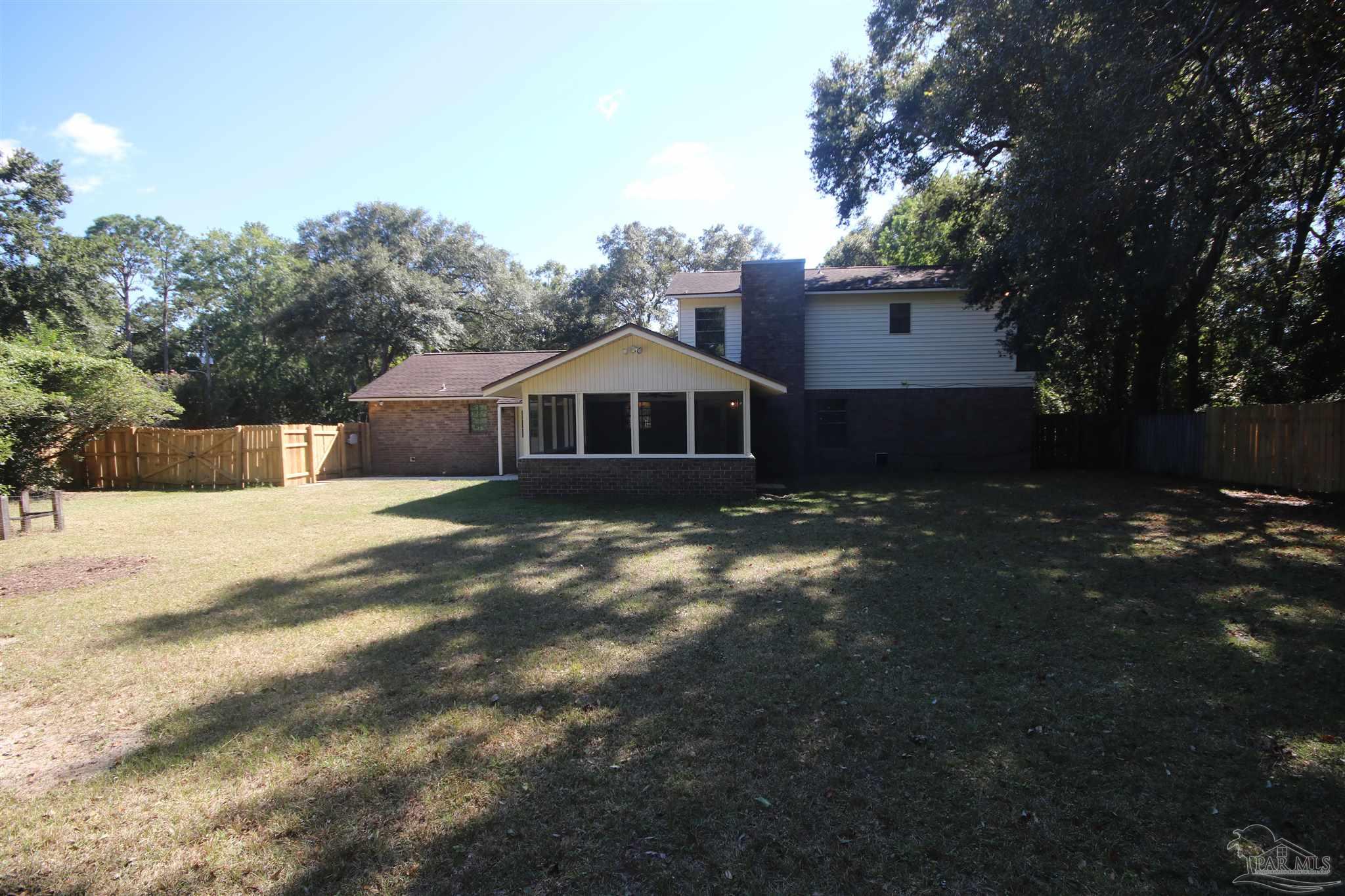 5464 Rowe Trail Pace, FL 32571 - Photo 44 of 50 to the left of the home is 9'6". 4' walk as well.