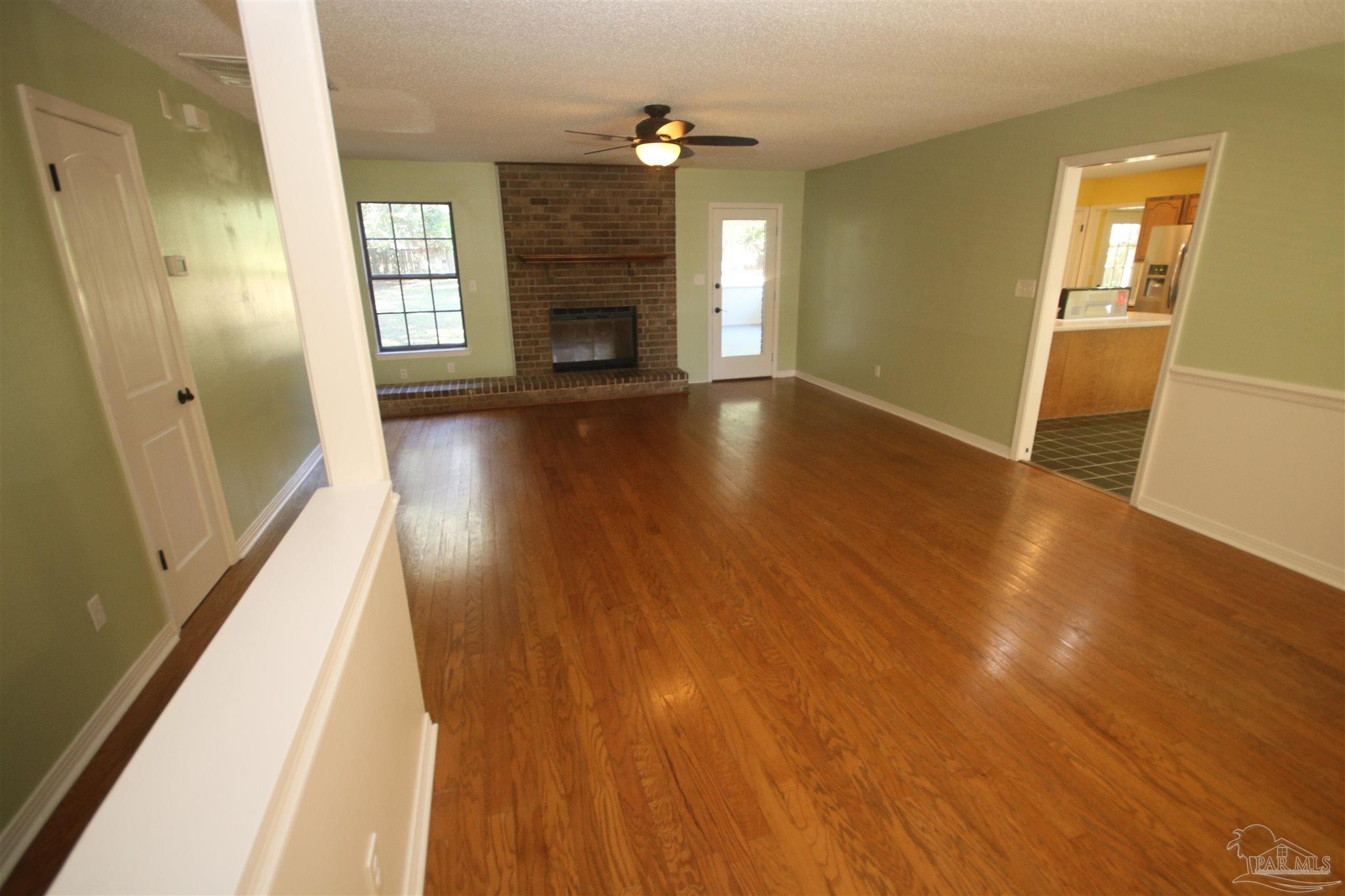 5464 Rowe Trail Pace, FL 32571 - Photo 7 of 50 Foyer to the left. View is from the dining area.
