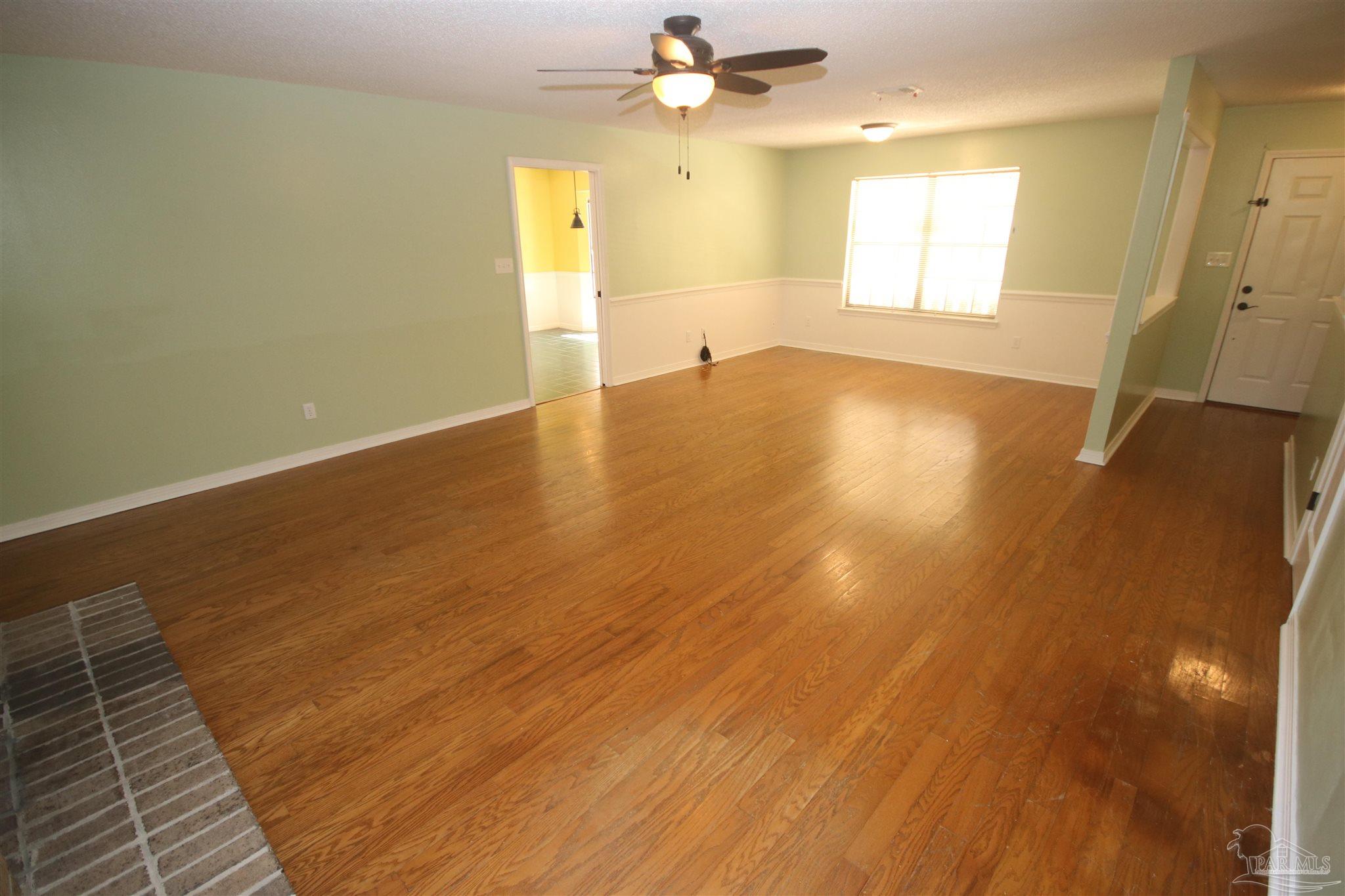 5464 Rowe Trail Pace, FL 32571 - Photo 9 of 50 Kitchen entrance to the left.