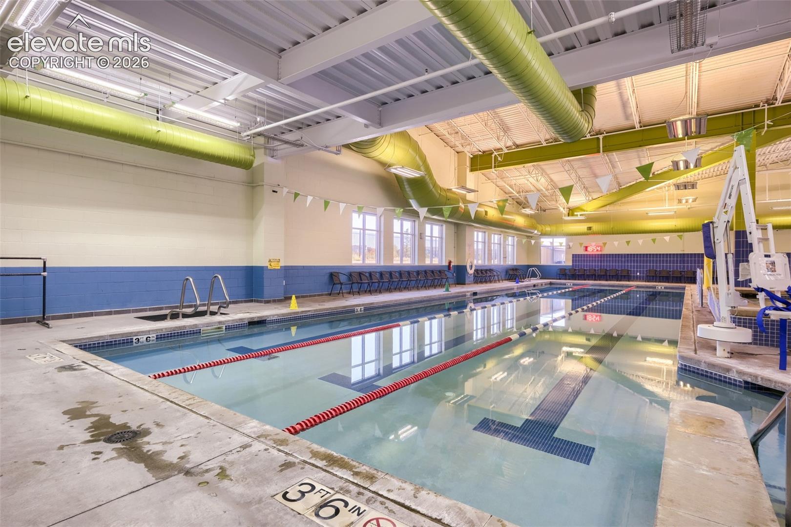 10149 Angeles Road Peyton, CO 80831 - Photo 21 of 24 Indoor aquatic facility featuring multiple swim lanes, a lazy river, a hot tub and a kid's play area