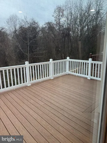 a view of deck in the backyard