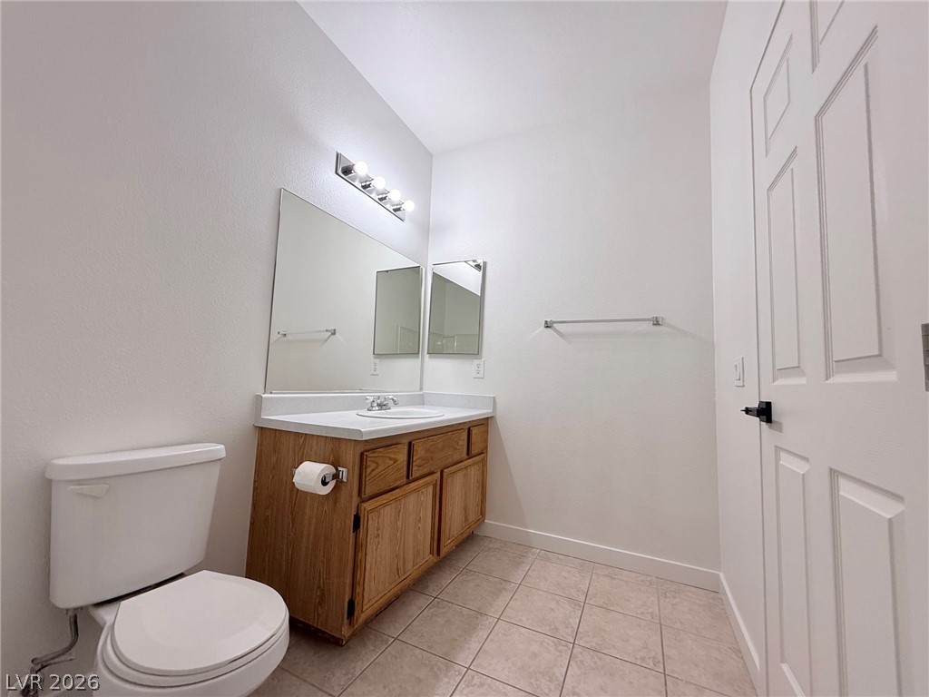 9050 West Warm Springs Road, Unit 2002 Las Vegas, NV 89148 - Photo 27 of 46 This bright bathroom features a vanity with ample counter space and a clean, functional design.