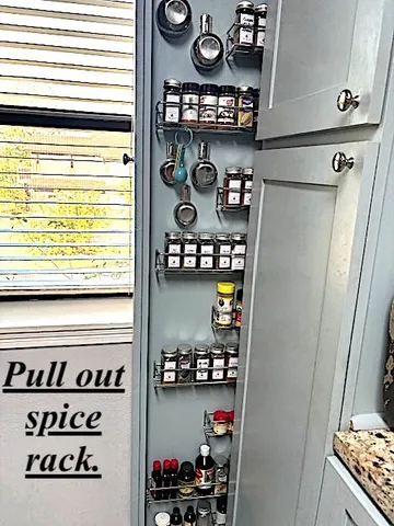 a living room with a couch and chairs