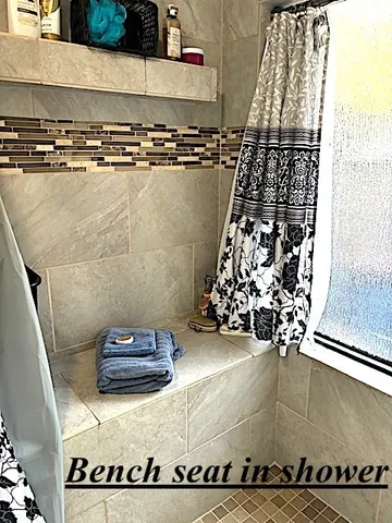 a bed room with a bed and a chair