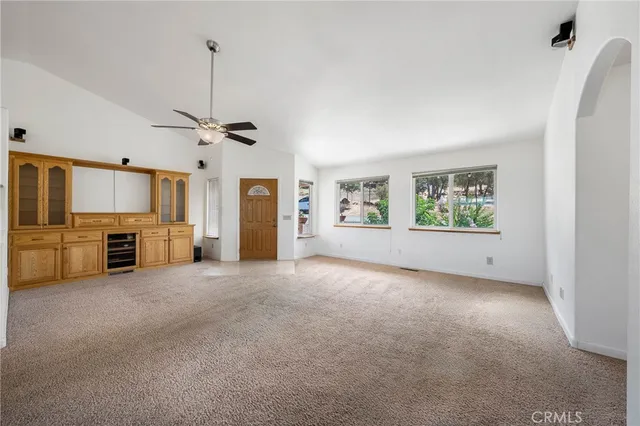 a view of a kitchen with a sink dishwasher and a refrigerator