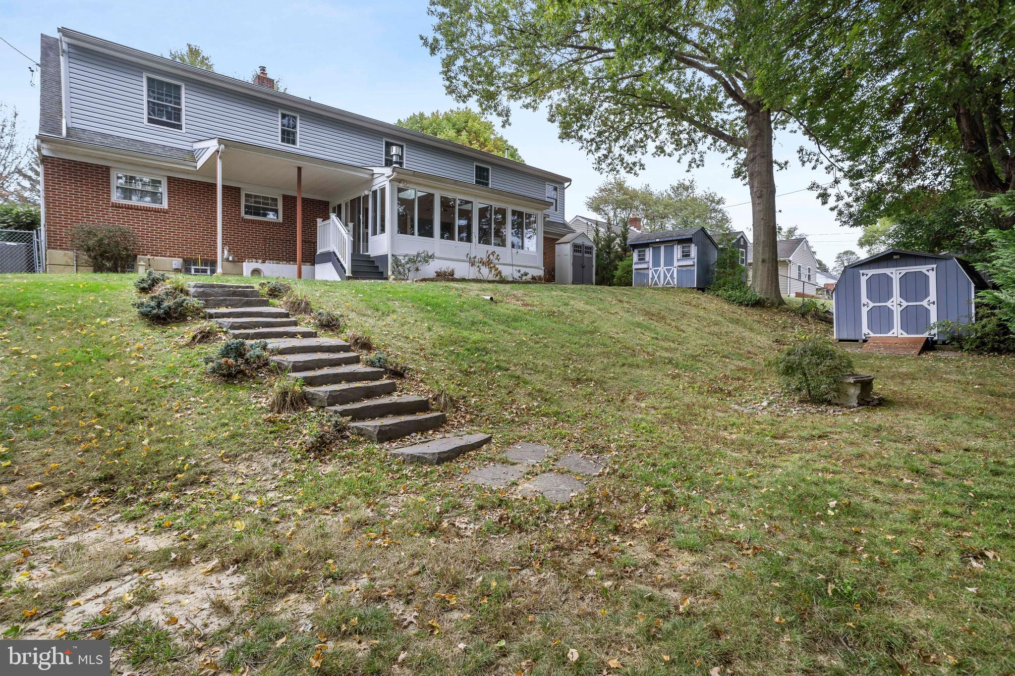 404 Langford Road Broomall, PA 19008 - Photo 36 of 40 a front view of a house with a yard