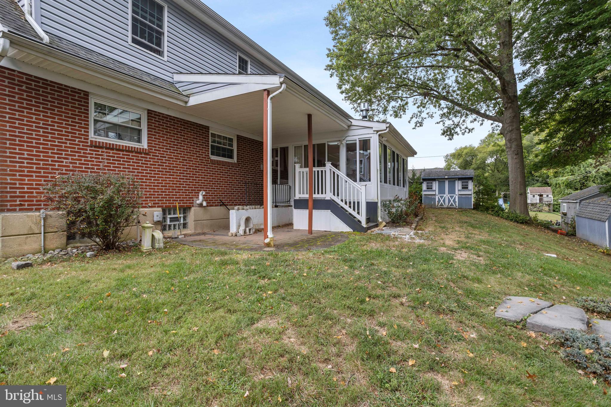 404 Langford Road Broomall, PA 19008 - Photo 37 of 40 a view of a house with a yard