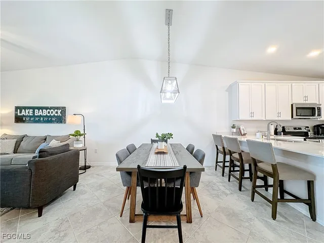 a view of a dining room with furniture