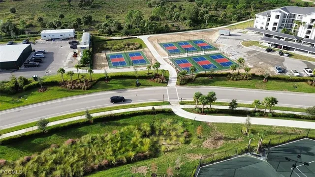 an aerial view of a house with outdoor space