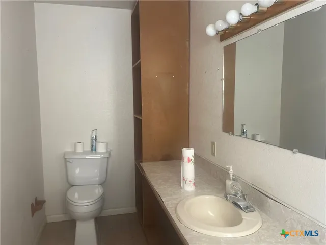 an empty room with furniture