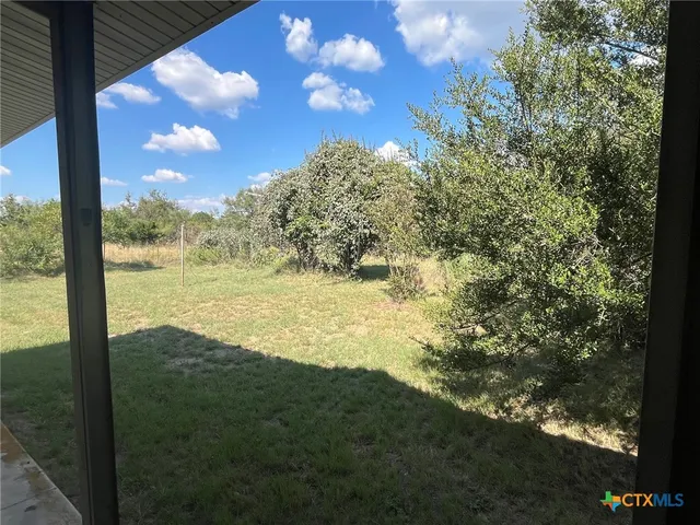 a view of a lake with a mountain
