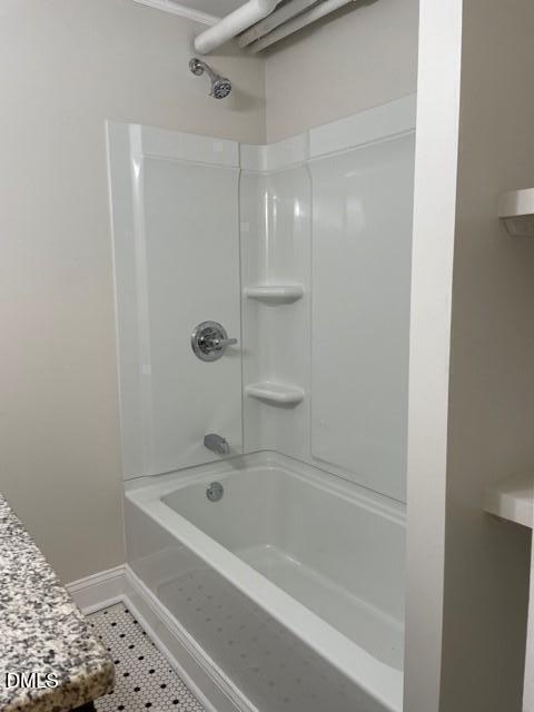 200 East Edenton Street, Unit 11 Raleigh, NC 27601 - Photo 8 of 9 a bathroom with a bathtub and a shower