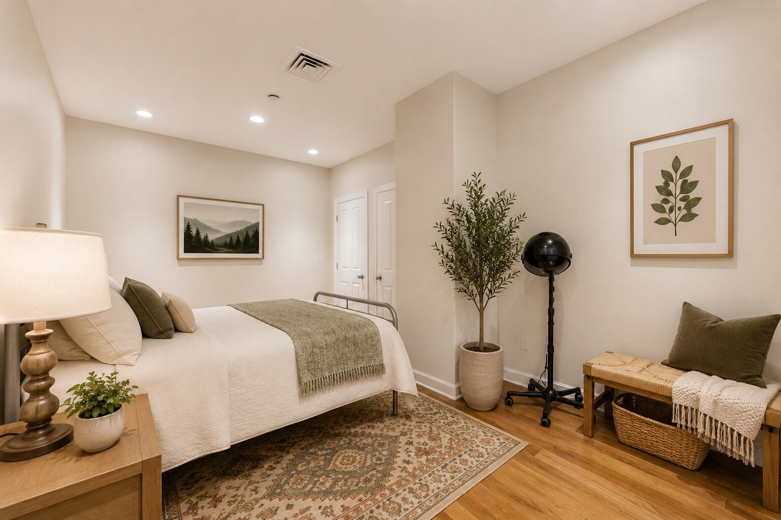914 Main Street, Unit 911 Houston, TX 77002 - Photo 21 of 30 a bedroom with a bed a couch and potted plant on the dresser