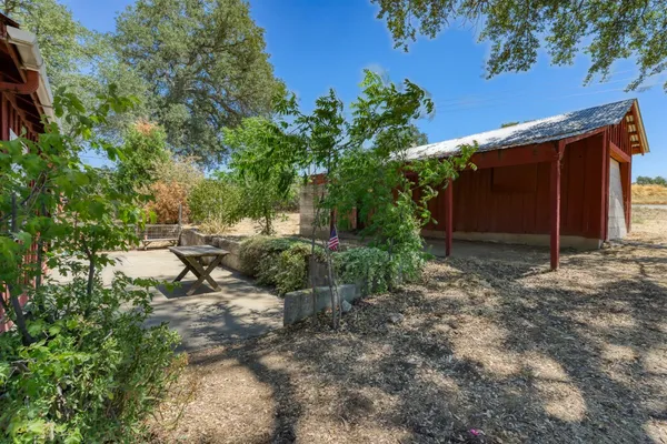 a backyard of a house with lots of green space