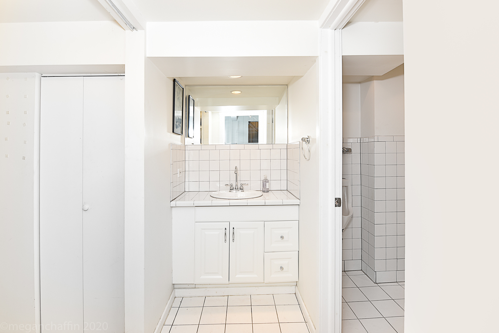 825 Sheridan Road Glencoe, IL 60022 - Photo 30 of 40 a bathroom with a sink a toilet and a mirror