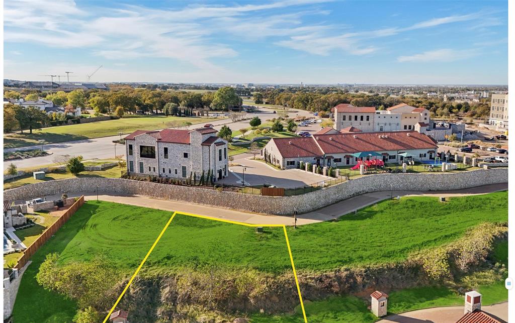 32 Catalonia Drive Westlake, TX 76262 - Photo 1 of 1 a aerial view of a house with a garden and lake view
