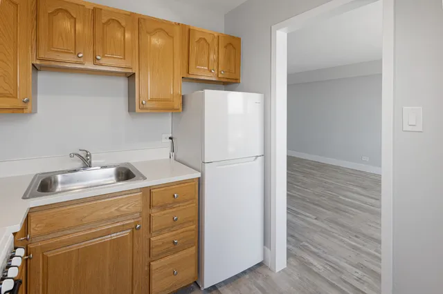 a utility room with cabinets