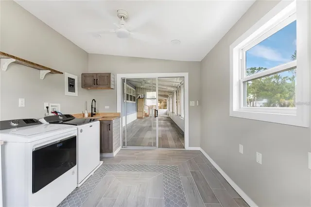 a kitchen with a stove and a sink