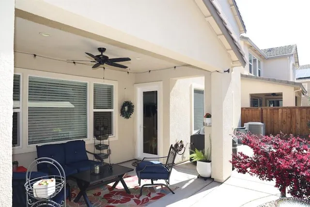 a front view of a house with many windows