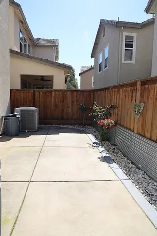 a view of a back yard of the house