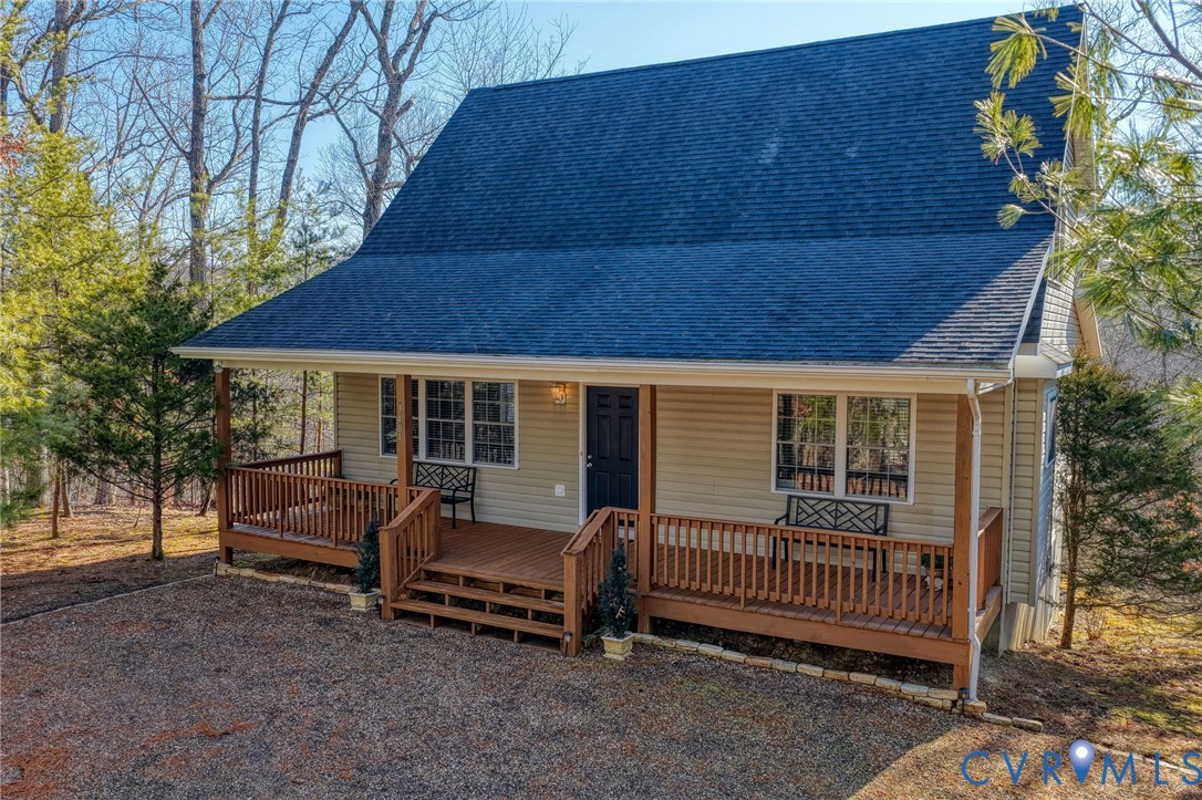 1401 Moccasin Way Basye, VA 22810 - Photo 1 of 1 a view of a patio with a table chairs and a barbeque